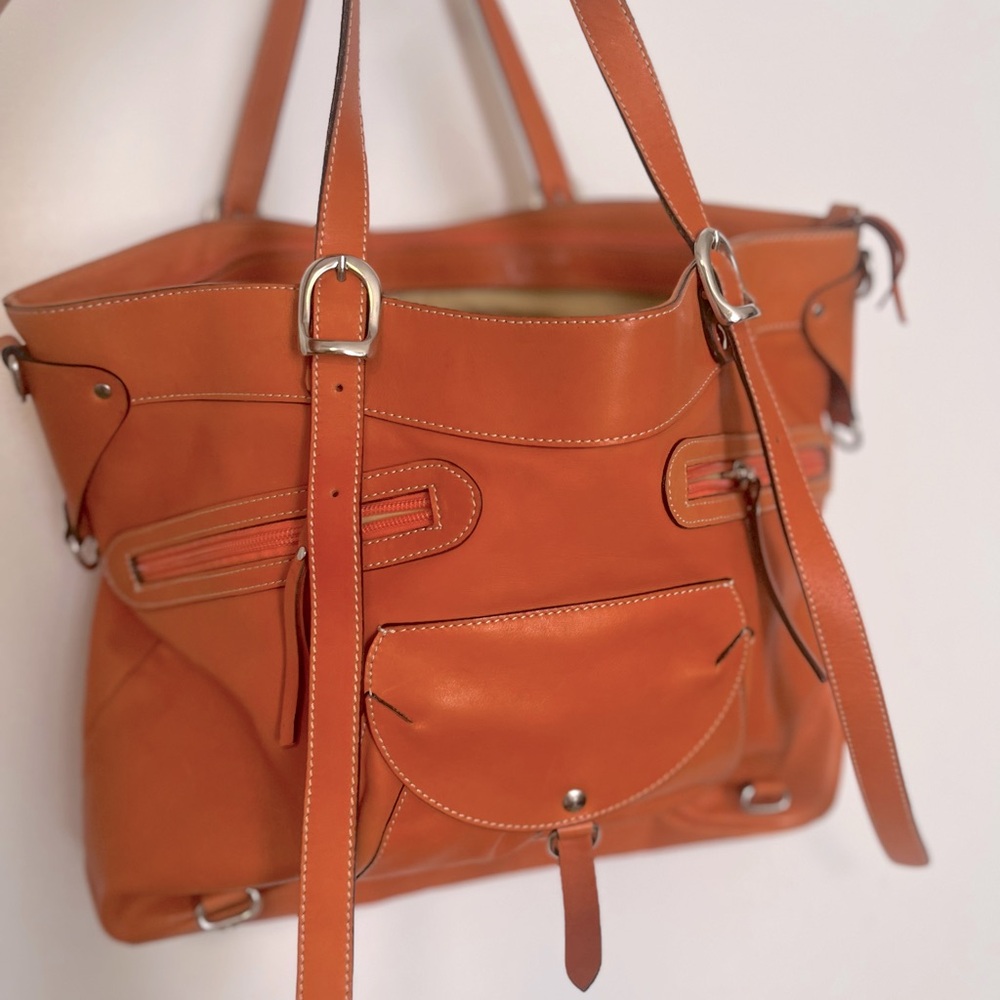 Large women’s orange tote.